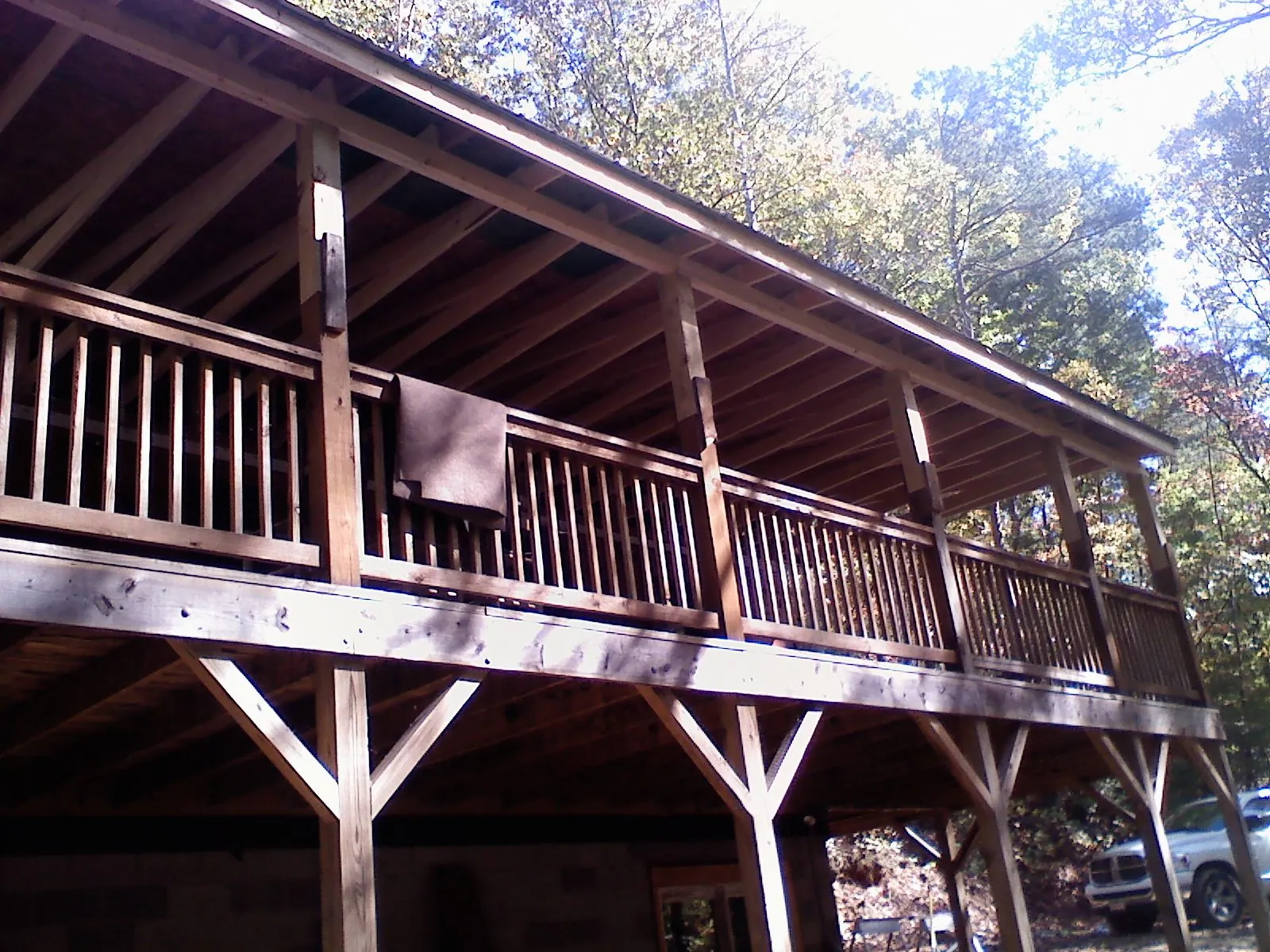 Timber framing under a new elevated porch and deck — Roof Leak Repair in Okeana by Roofing Brothers